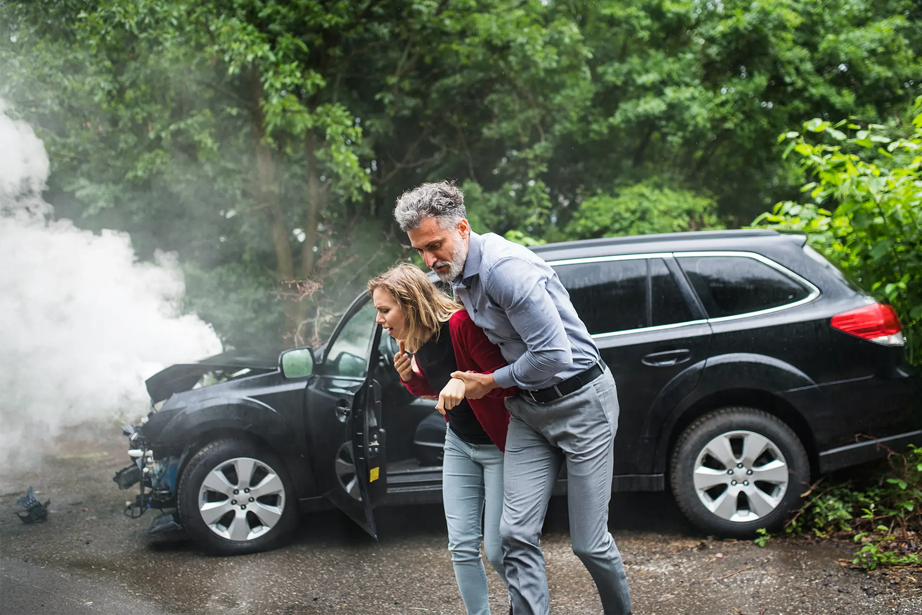 business-communication-connection-people-concept-2023-11-27-04-51-56-utc copy man helping a woman involved in car accident